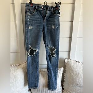 Distressed Blue Jeans
